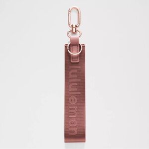 NWT NEVER LOST KEYCHAIN - Red Clay/Rockwood REDC/ROWD - Lululemon OOS ONLINE!